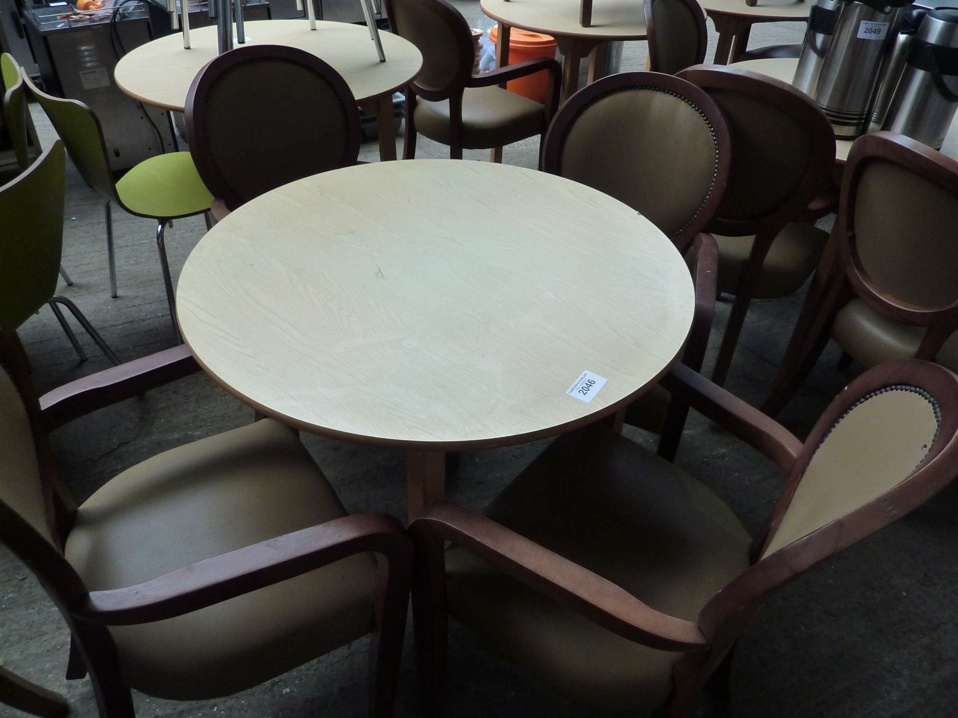 Wooden table with four upholstered chairs