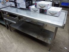 Stainless steel table with under shelf/drawer