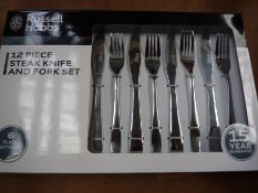 Twelve piece Russell Hobbs Steak knife and fork set.