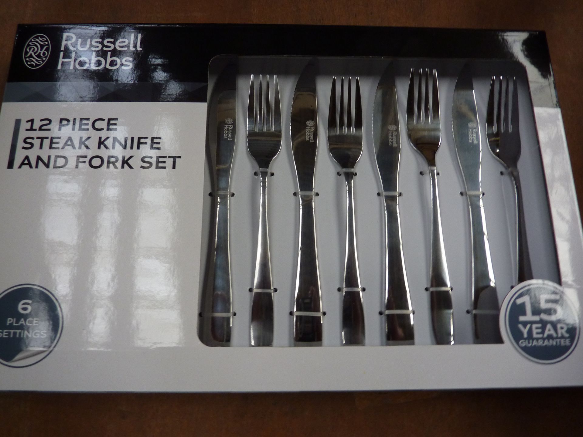 Twelve piece Russell Hobbs Steak knife and fork set.