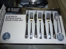 Twelve piece Russell Hobbs Steak knife and fork set.