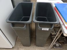 Two waste bins.