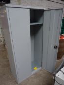Two door metal cabinet.