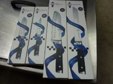 Four Le Cordon Bleu knives, small and large santoku, bread and utility.