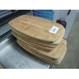 Ten wooden serving boards.