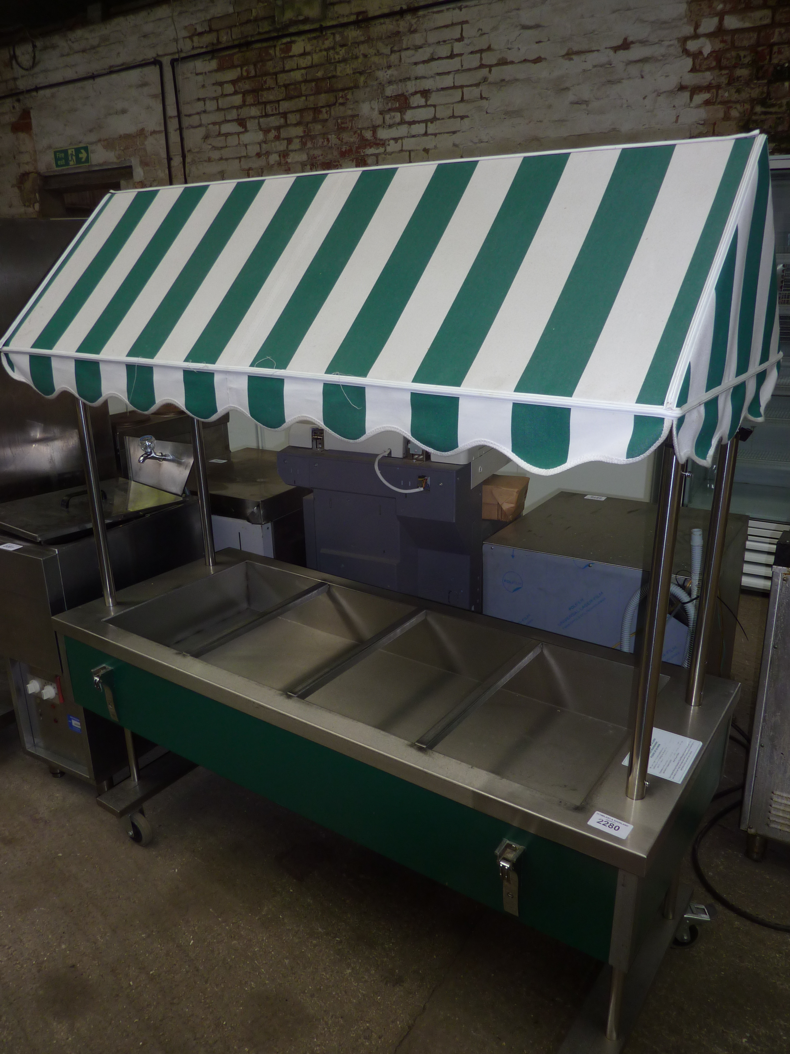 Salad counter with canopy.