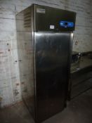 Caravelle stainless steel finish single door upright freezer.