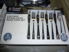 Twelve piece Russell Hobbs Steak knife and fork set.