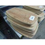 Ten wooden serving boards.