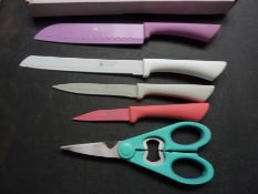 Four piece knife set with scissors.