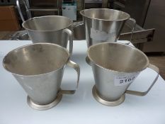 4 stainless steel measuring jugs