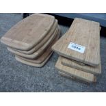 Ten wooden serving boards.