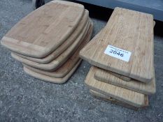 Ten wooden serving boards.