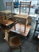 Folding table and two chairs.