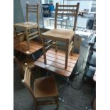 Folding table and two chairs.