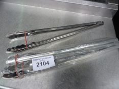 Three large tongs