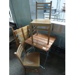 Folding table and two chairs.