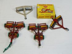 Two Dinky Toys Disc Harrows, and two Dinky Toys Triple Gang Mowers
