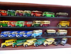 Wooden display case containing 28 assorted Buses