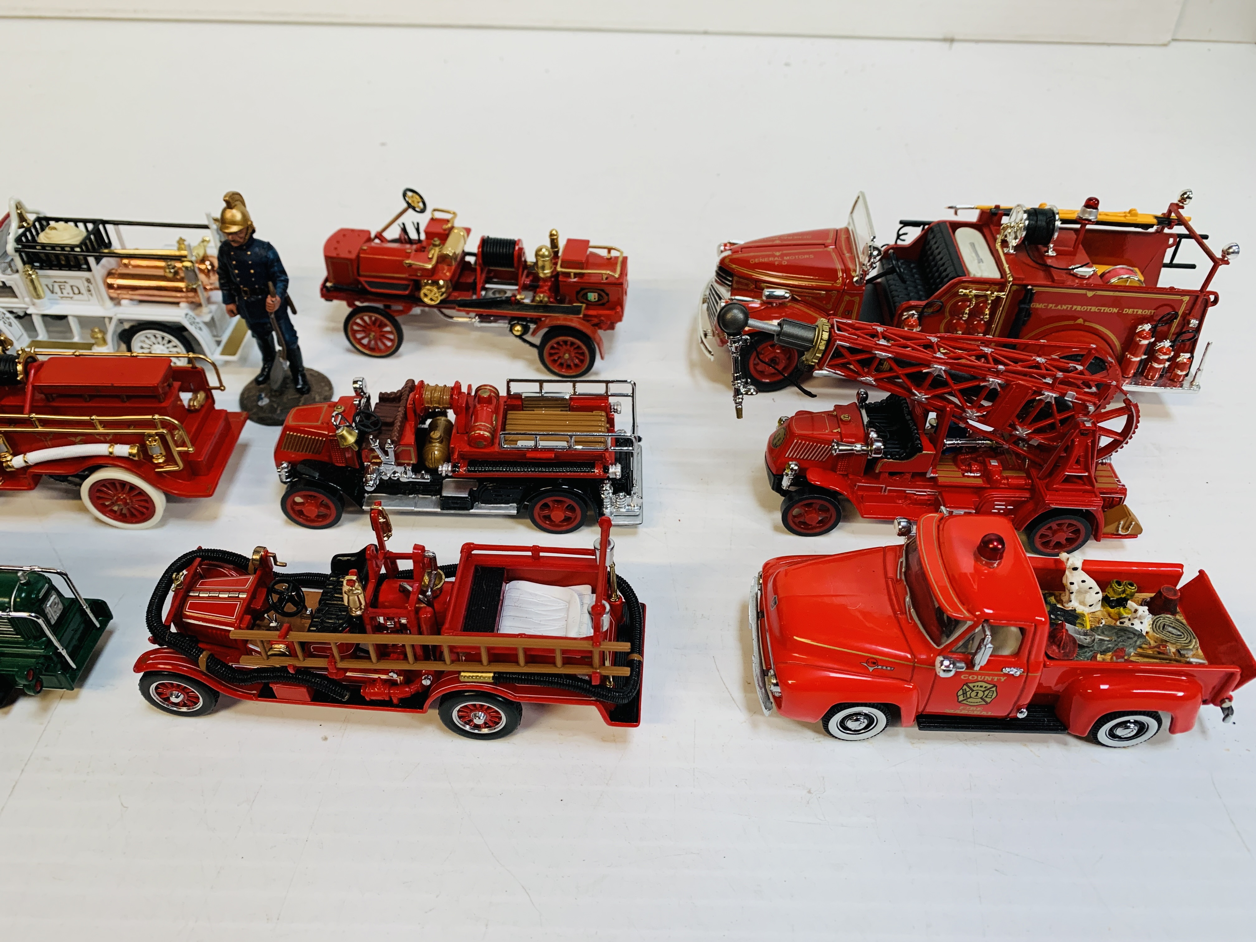 Ten assorted fire fighting vehicles, and a fireman. - Image 2 of 3