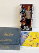 Justin Bieber doll, Corgi model circus, and Trivial Pursuit