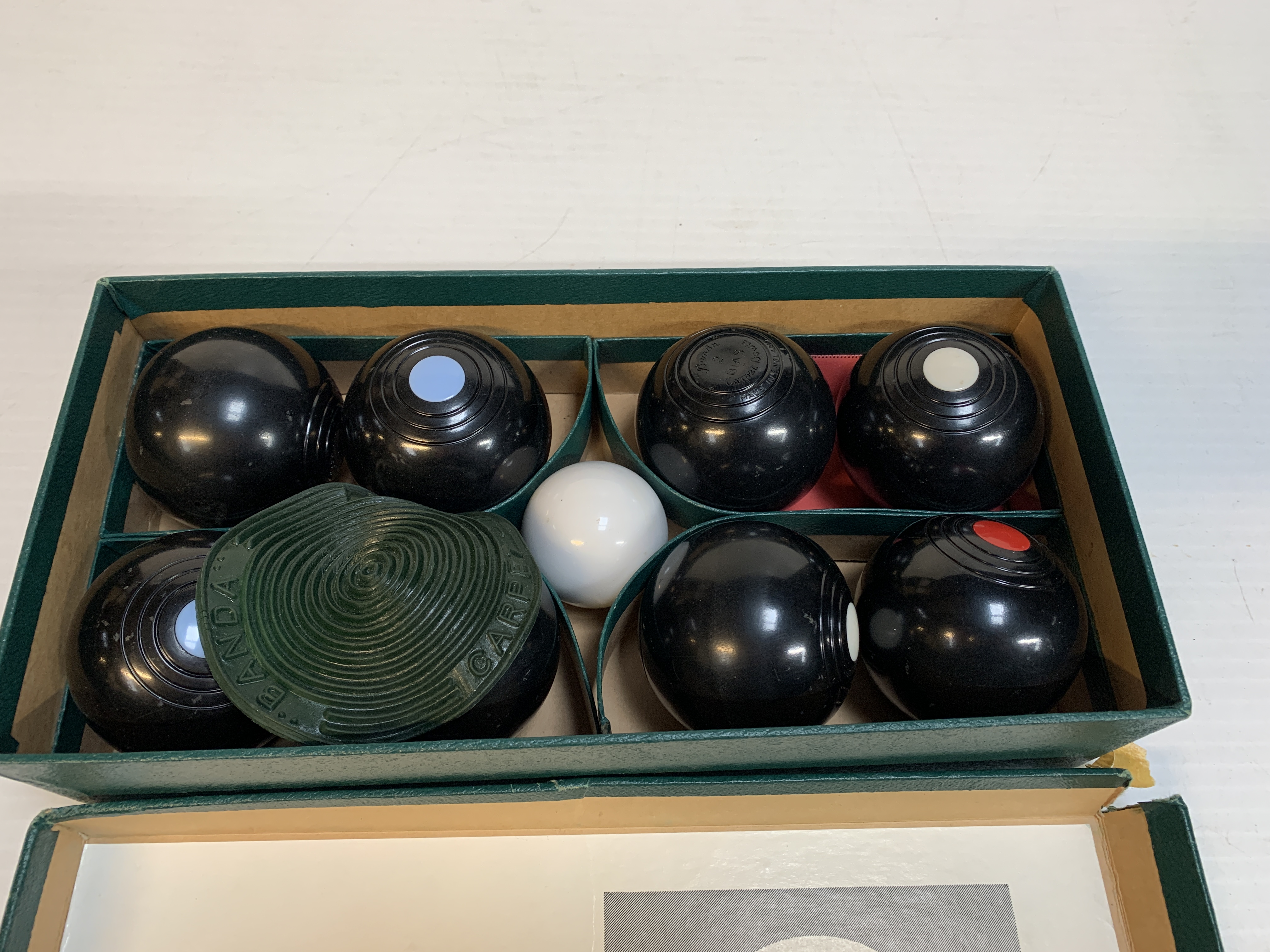 Boxed set of B&A carpet bowls comprisig 8 bowls and a jack.