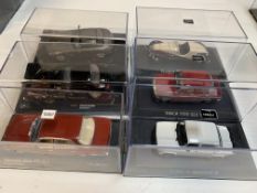 Six various model cars