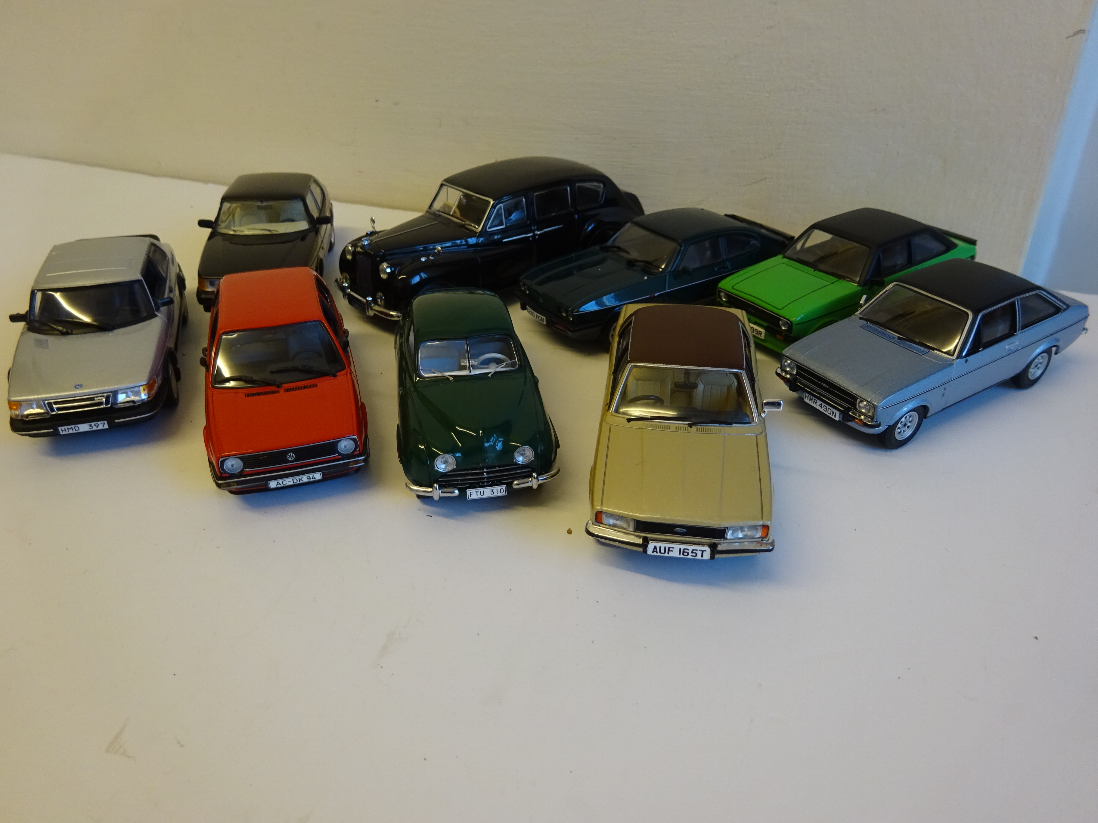 9 assorted cars.