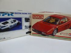 Ferrari Testarossa and a Porsche 917K