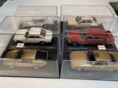 Six various model cars