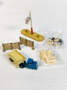 Dinky Toys 'Esso' Sign, barrels and crates; and a Dinky Toys 3 wheel truck and trailer