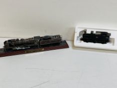 Bachmann Fowler BR black locomotive in box; together with a model locomotive on track.