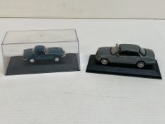 Vanguards Triumph Spitfire in box; together with a Lledo Jaguar.