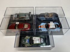 Five various model Aston Martins