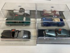 Six various model cars