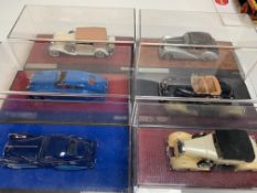 Six various model cars