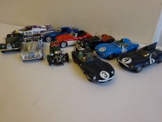 4 assorted racing cars and 6 others