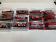 Twelve boxed Del Prado fire fighting vehicles