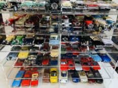 74 diecast cars in plastic mirror back display case