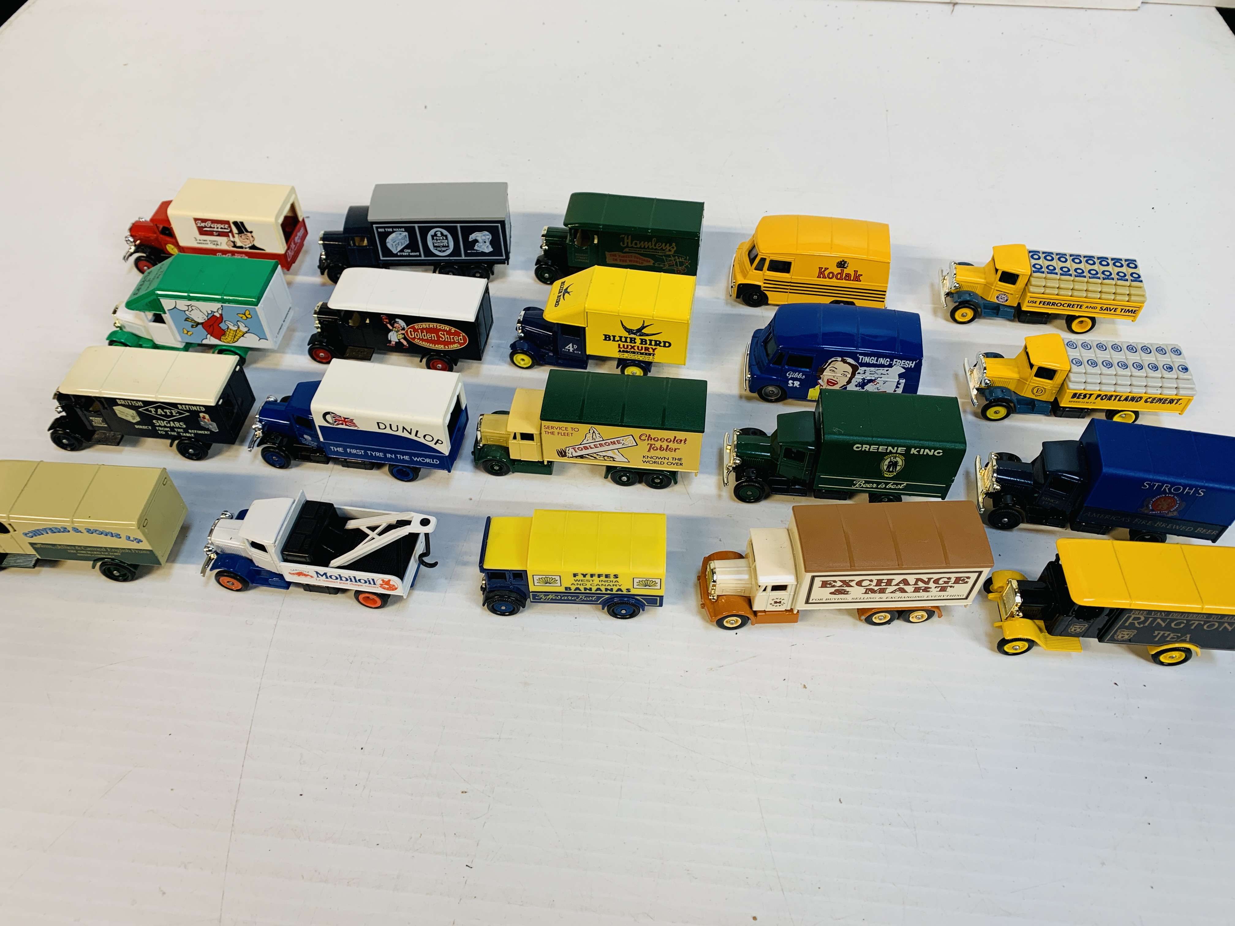 Twenty assorted commercial vehicles