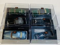 Six various model Jaguars