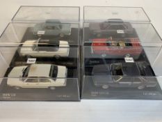 Six various model BMWs