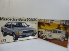 Mercedes-Benz 500SEC and a Cadillac Town Car