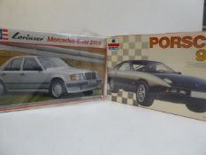 Mercedes-Benz 230E and a Porsche 928