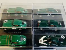 Seven various model Aston Martins