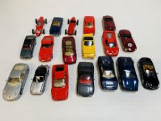 Eighteen model sports cars, mainly Ferraris.