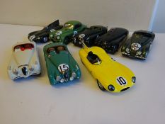 8 assorted racing cars by Spark.