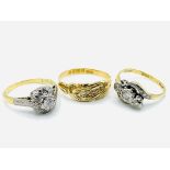 Two 18ct gold and platinum diamond rings and an 18ct gold ring