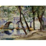 Framed and glazed watercolour of trees by a river and a bridge, signed M Wells