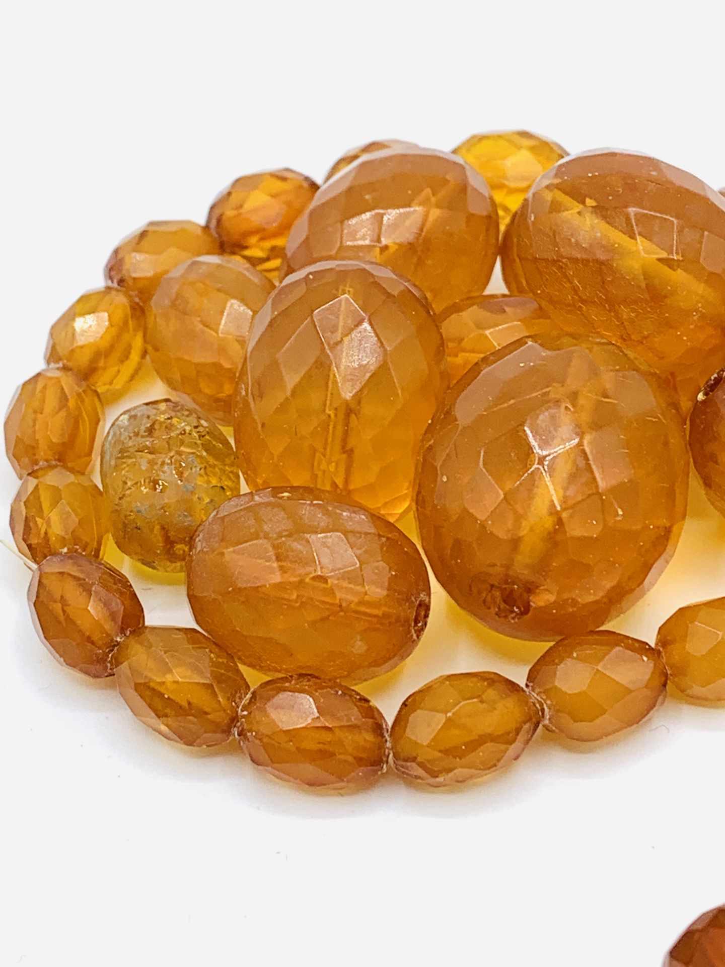 Cognac amber beads, faceted and graduated - Image 2 of 3